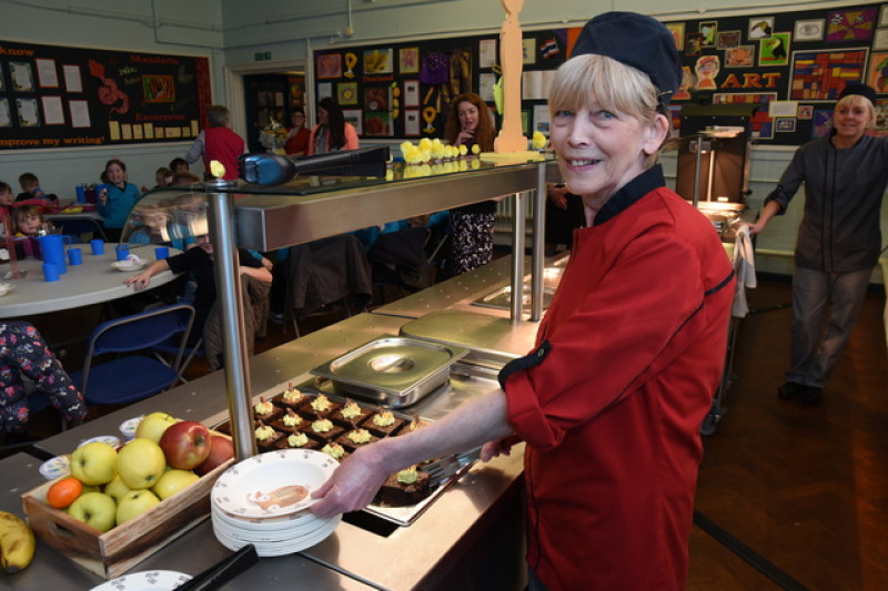 Main image for Dinner lady hangs up pinny