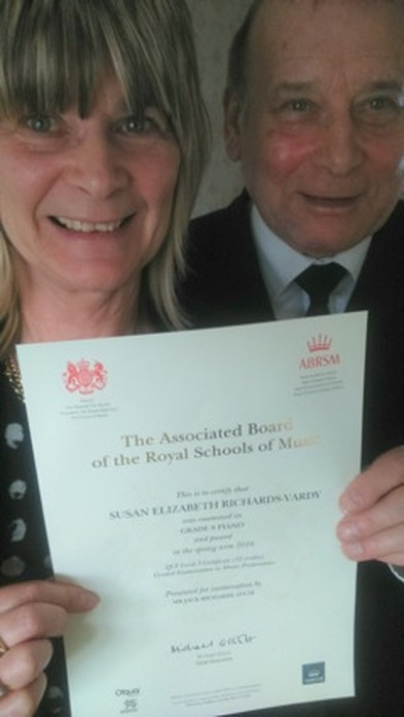 Main image for Woman passes piano exam with help from dad