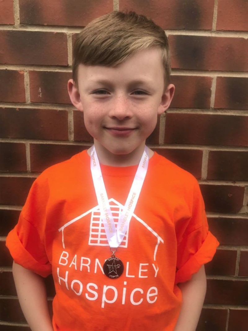Main image for Swimming academy raises cash for Barnsley Hospice