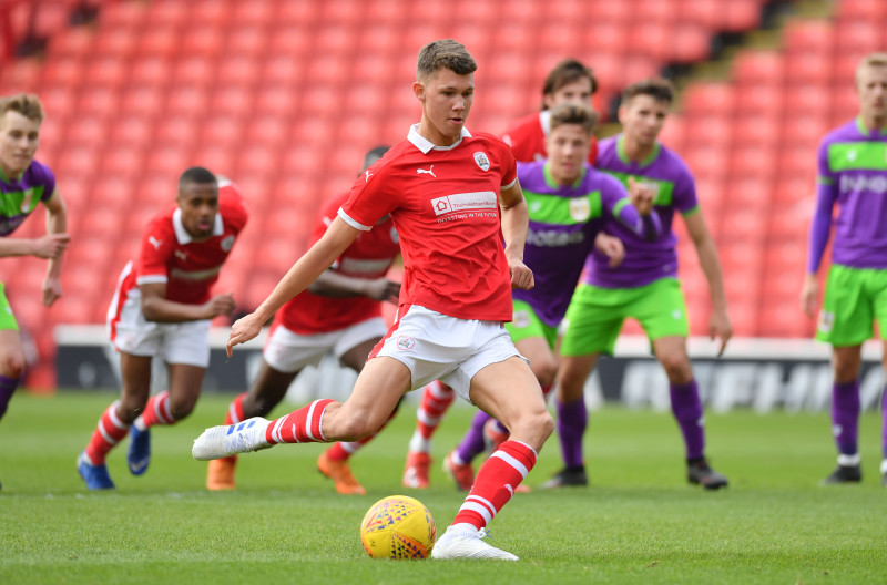 Main image for Wolfe at the door of first team – Devaney