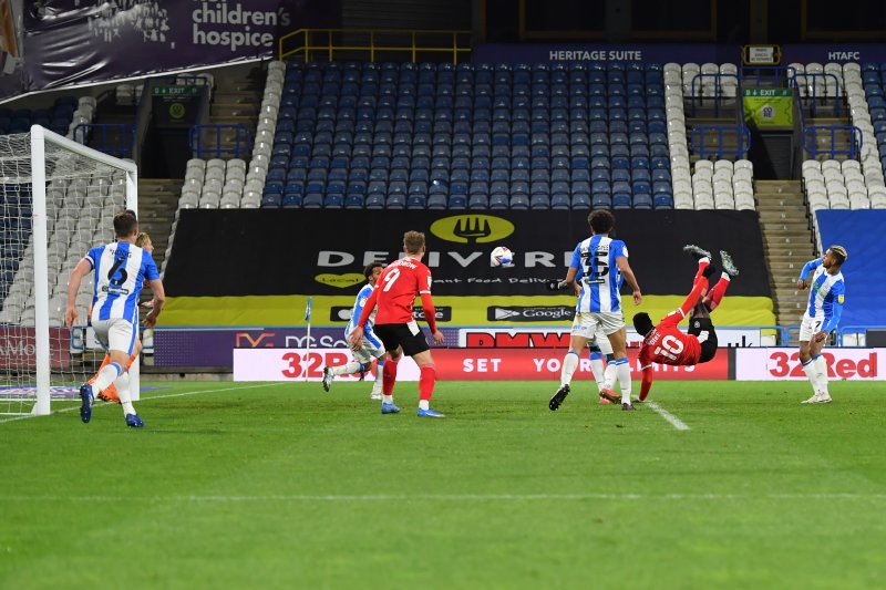 Main image for Dike overhead kick secures win for dominant Reds