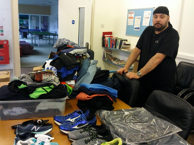 KIND: John El-Jeizawi with the donations.