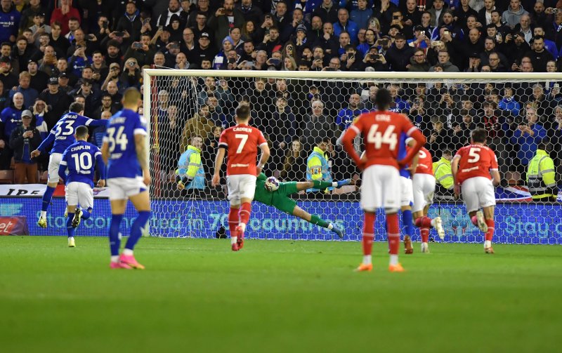 Harry Isted saves a penalty