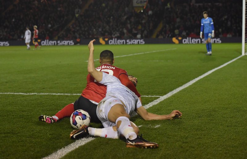 Ex-Red Ethan Erhahon clashes with Adam Phillips