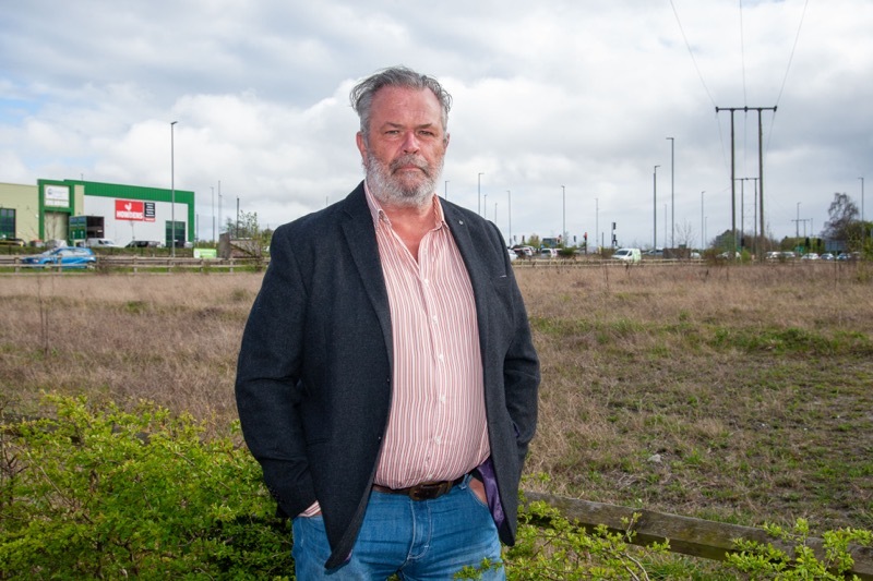 MORE UNITS: Coun Dave White on the site where planning has been passed for another 7 warehouse units. Picture Shaun Colborn PD093051