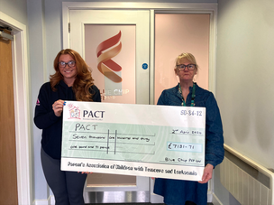 FUNDRAISER: Ellie Sawyer hands over the cheque to Beryl Welburn.