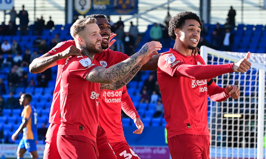 Jon Russell celebrates his goal at Shrewsbury in October