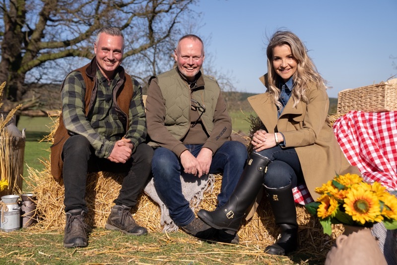 SPRINGTIME ON THE FARM: David and Rob Nicholson with Helen Skelton. Picture: Dale Lavender.