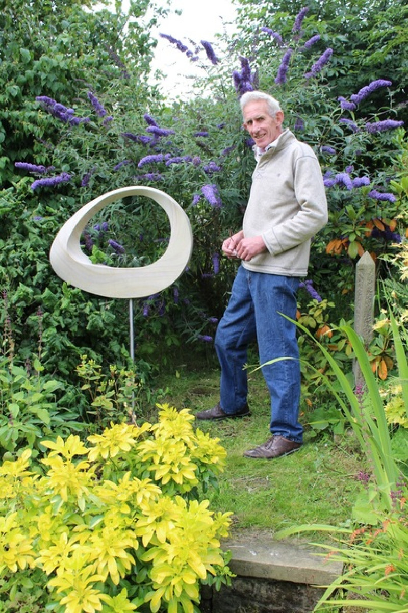Main image for Sculptor creates art in the garden