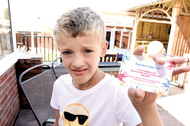 Main image for Boy's business cards keep people informed