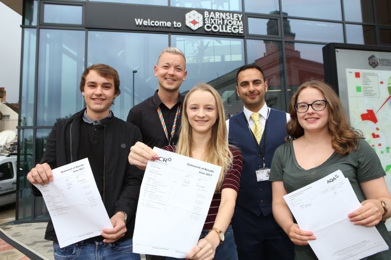 Main image for College students celebrate A Level results
