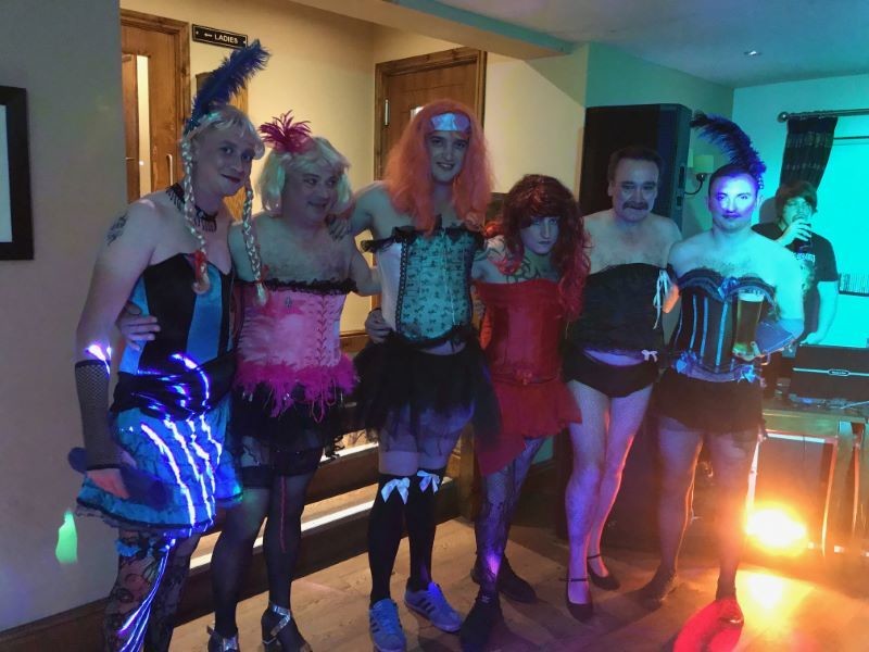 Main image for Men take part in Moulin Rougue bar crawl