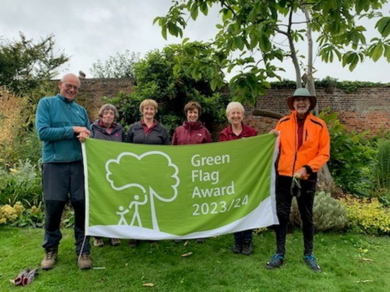 GREEN FLAG: The volunteers celebrating the award.
