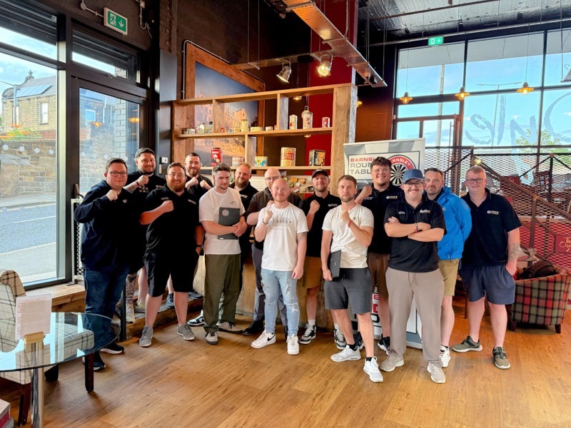 TEAM WORK: Some of the Barnsley Round Tablers supporting 
one of their members who was fighting to raise money for charity at an ultra white collar boxing event.