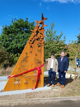 UNVEILING: Patrick Murphy and Coun James Higginbottom with the artwork.