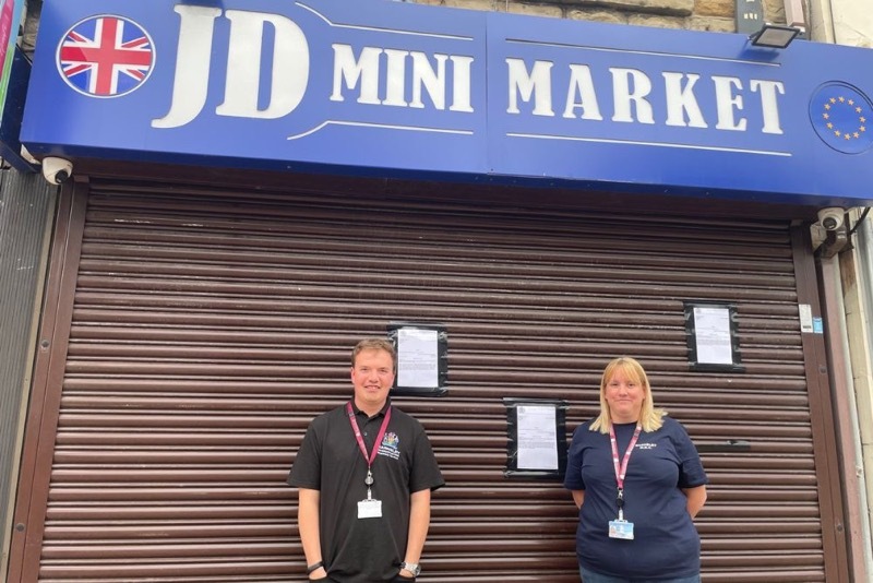 CRACKDOWN: Jack Brannan and Sarah Dodd outside the now-closed shop.