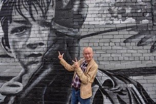LEGACY: Dai Bradley in front of the mural. Picture: Andrew Copley.