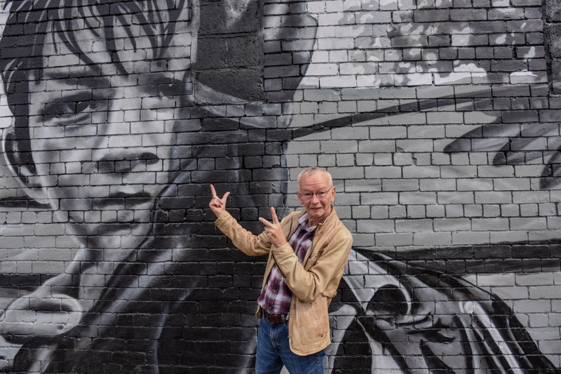 LEGACY: Dai Bradley in front of the mural. Picture: Andrew Copley.