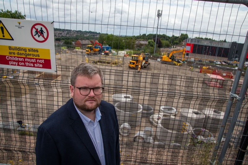 SEAM LOOKING GOOD: Coun James Higginbottom views progress at the latest Barnsley building project. Picture Shaun Colborn PD094335