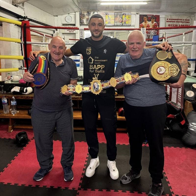 BARNSLEY STAR: Callum with his former coaches Trevor Schofield and John Sagar.