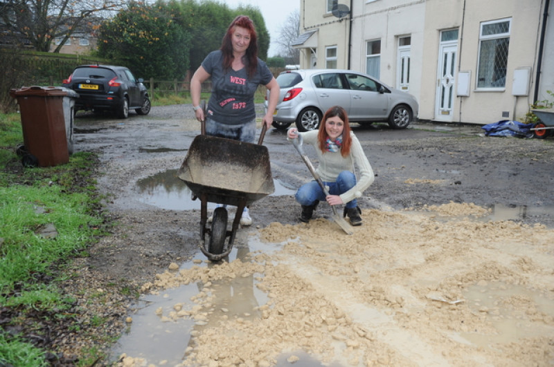 Main image for Builders help in pot hole request
