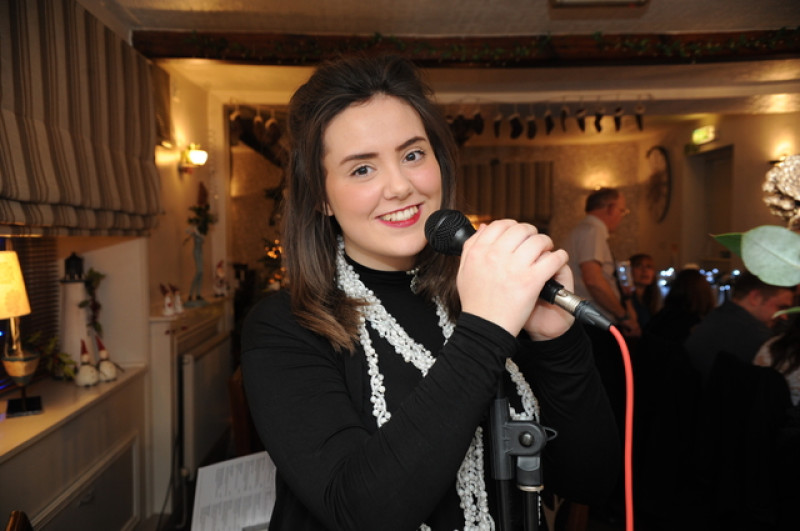 Main image for Teenager hits the right note as singing staff member