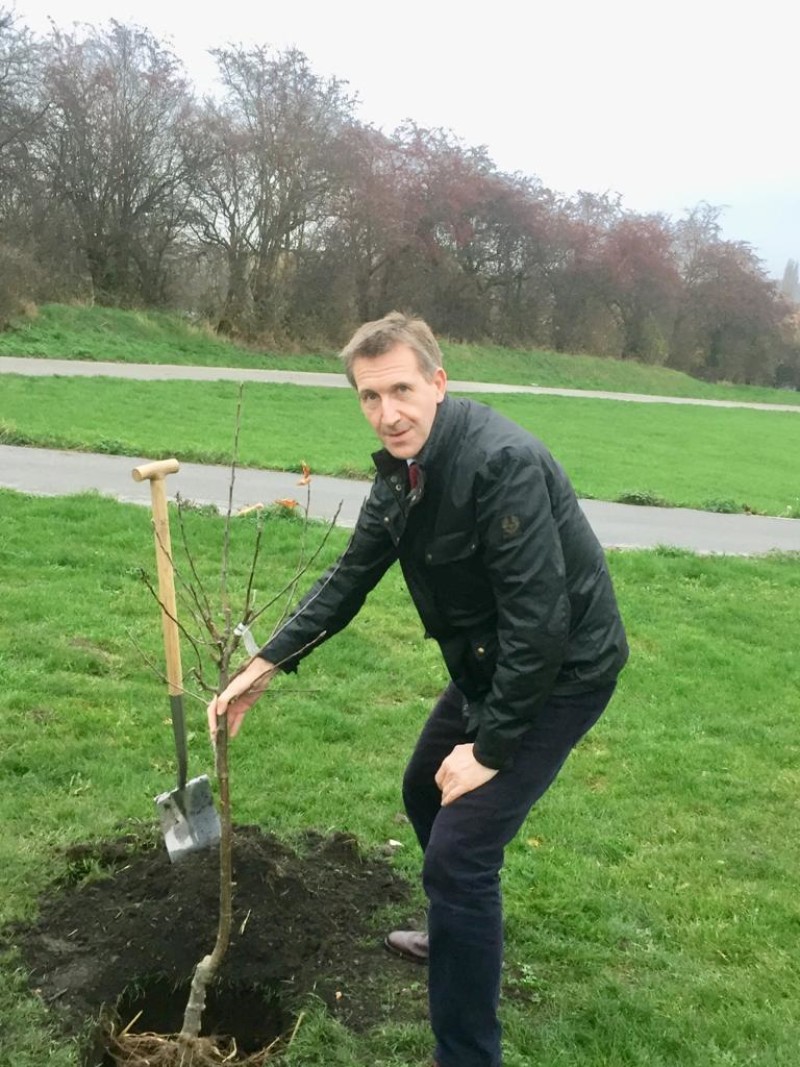 Main image for MP digs in at planting event