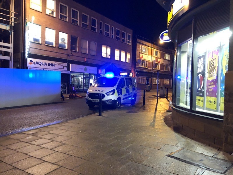 Main image for Police arrest injured man after windows smashed