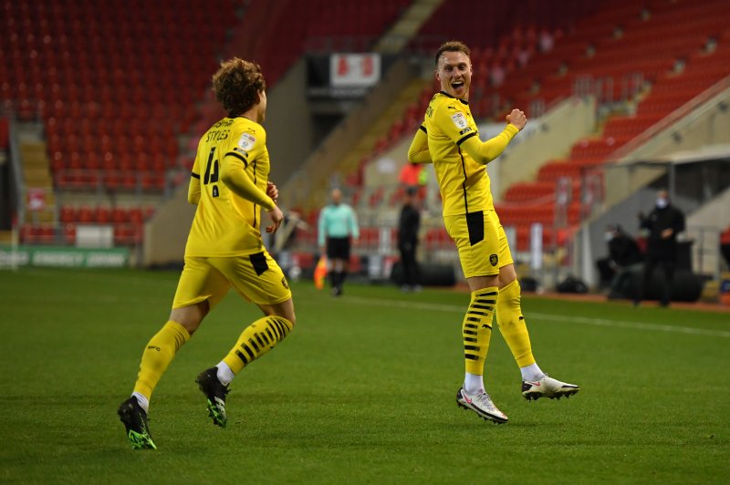 Main image for Reds climb closer to play-off places as Woodrow and Mowatt ensure derby win
