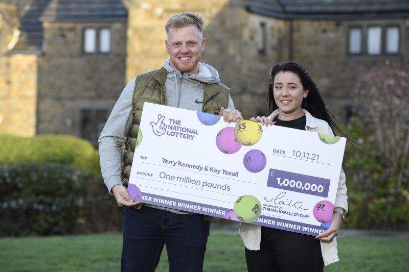 Terry Kennedy and Kay Yoxall with their £1m cheque.