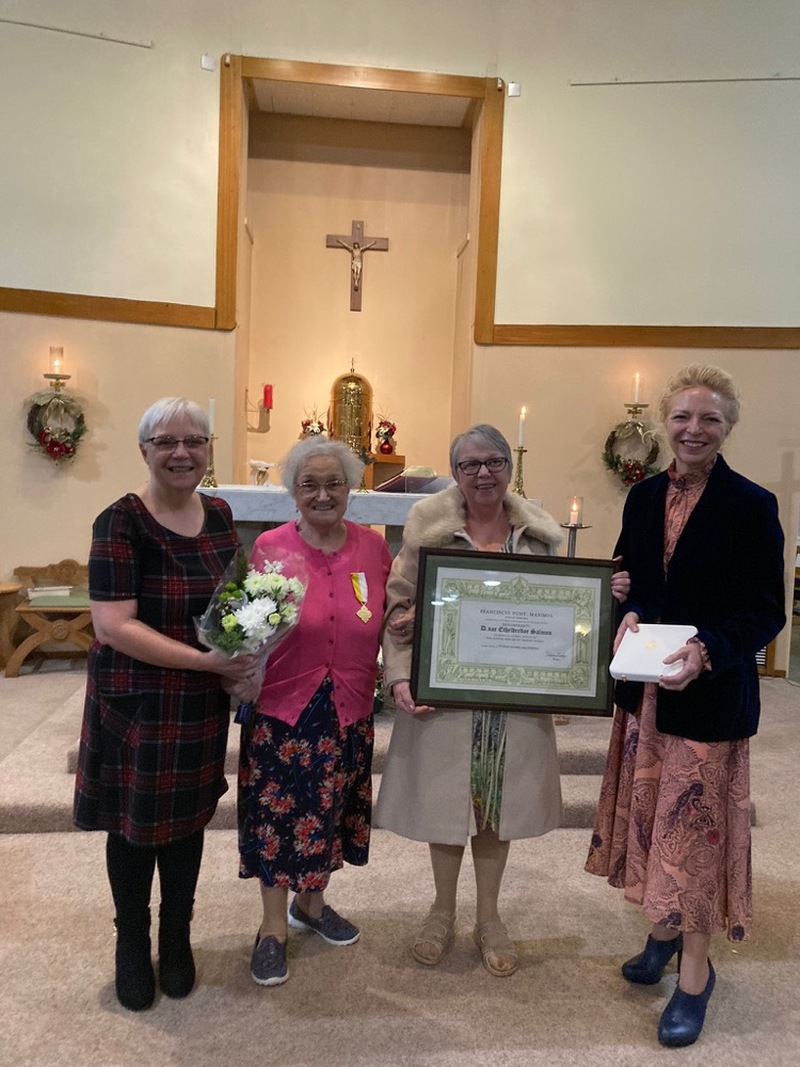HOLY HONOUR: Audrey Salmon with three of her eight children, Bridget, Rachel and Elizabeth.