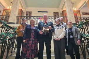 COMMITMENT: Barnsley Council members gather at the town hall to toast the White Ribbon accreditation - but complaints have been made about leaving Coun Nayeri out.