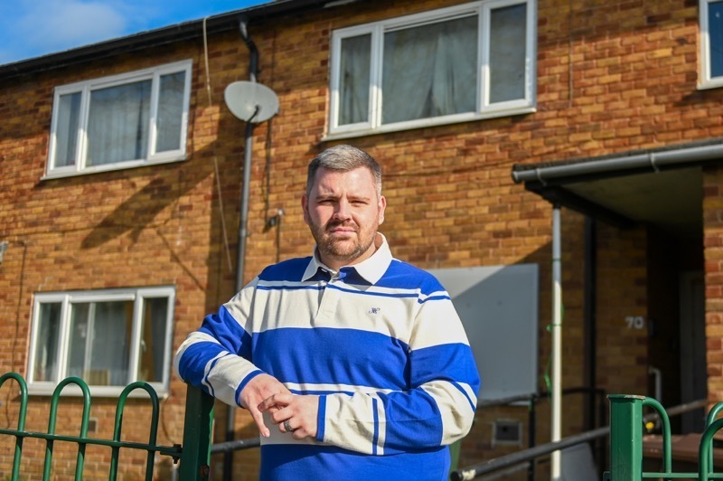 SCANDAL: Coun Jake Lodge outside an empty home.