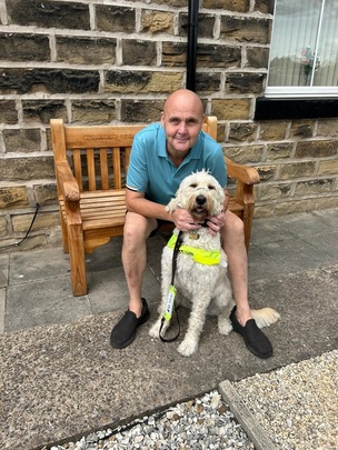 PARTNERS: Lee with his beloved guide dog, Isha.