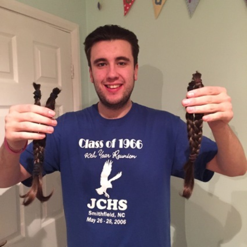 Main image for Stroke victim cuts hair for charity