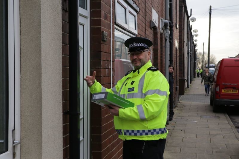 Main image for Police flood town centre in crackdown
