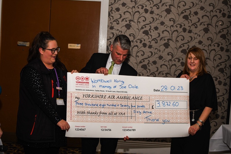 FUNDRAISING SUCCESS: Joe Dale’s parents, Jon and Helena, and a member of the YAA.