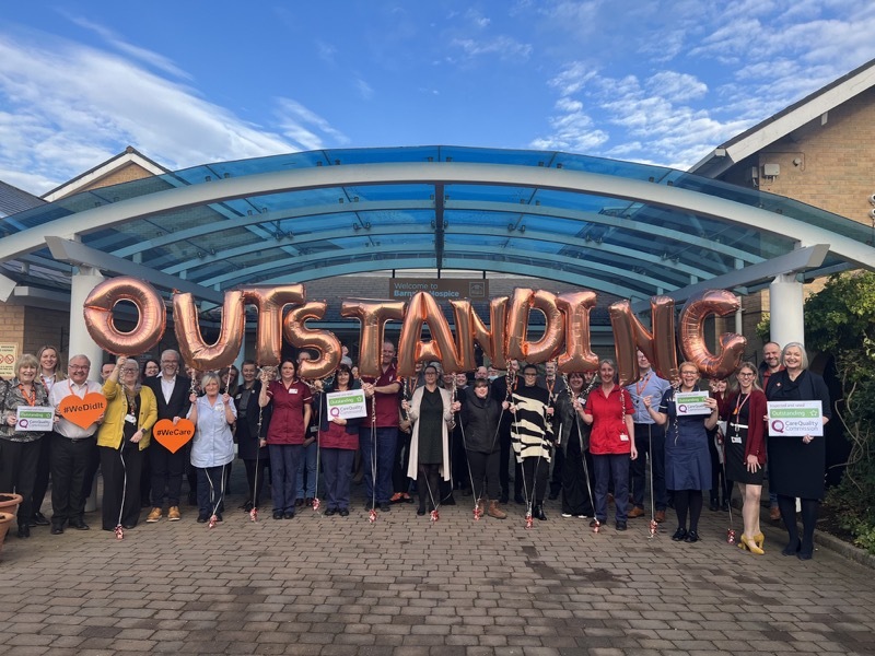 OUTSTANDING: Hospice staff celebrate their remarkable turnaround.