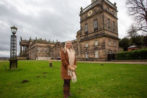 FUNDRAISER: Carole Foster in front of the North Tower.