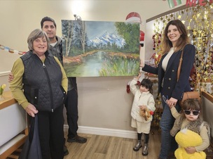 The artwork is handed over to the care home.