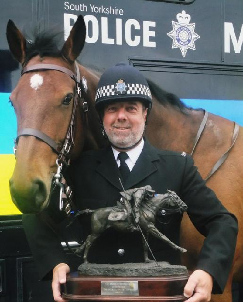 Main image for Long-serving police officer hangs up reins