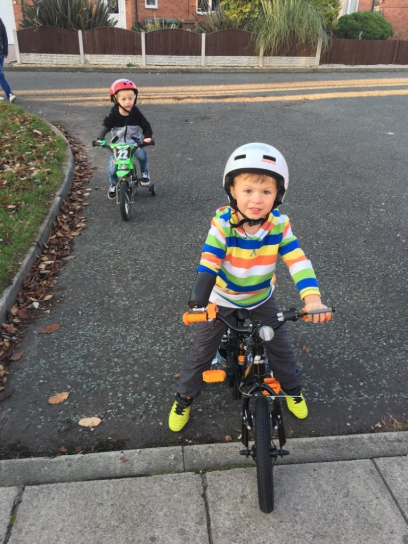 Main image for Dad encourages children to get on their bikes...