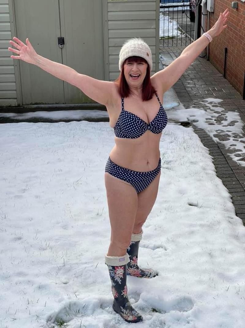 Main image for Bikini-clad woman raises charity cash