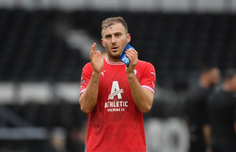Main image for Kane pleased with 50 games and wants 'a lot more'