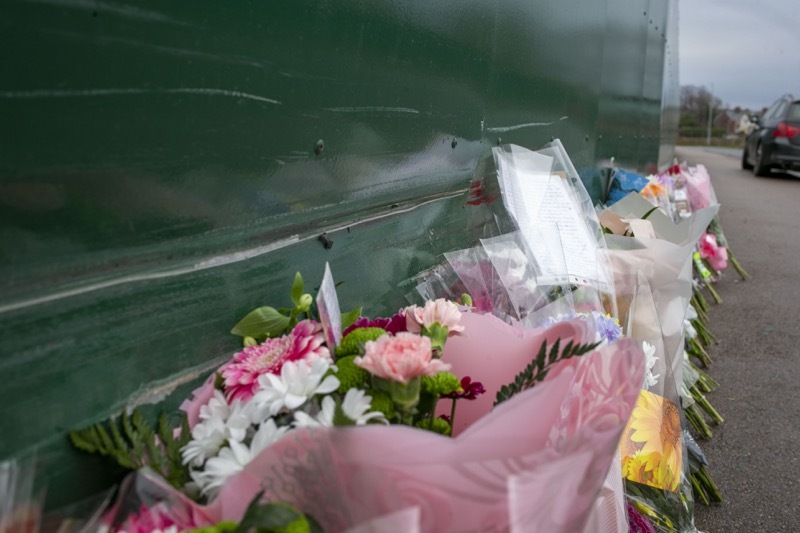 Floral Tribute: Flowers left at the scene of an horrific incident which left a father and his son dead. Picture Shaun Colborn PD091833