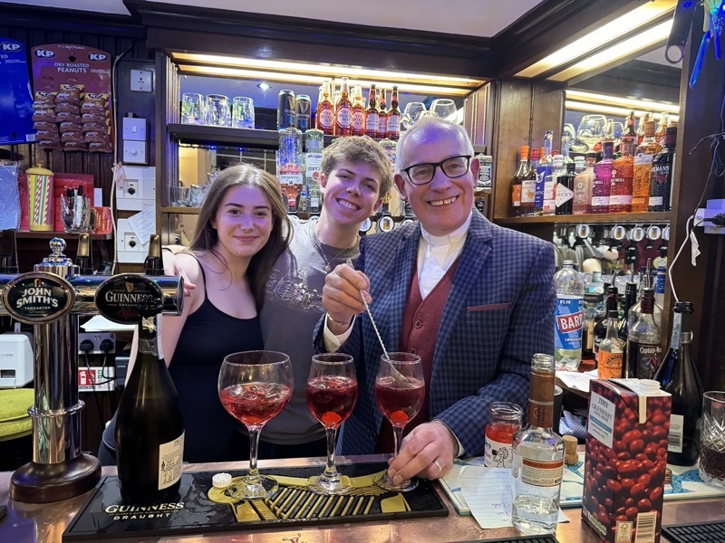 Canon Keith Farrow mixing his signature ‘Canon on the Roof’ cocktail at the Comrades Club.