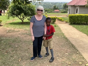 Carol Higgins with ten-year-old Mark Wasswa who she sponsors.
