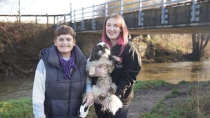 HERO: Kathryn Simpson (right) with Holly the dog and Shirley Millard. Picture: Scott Firth.