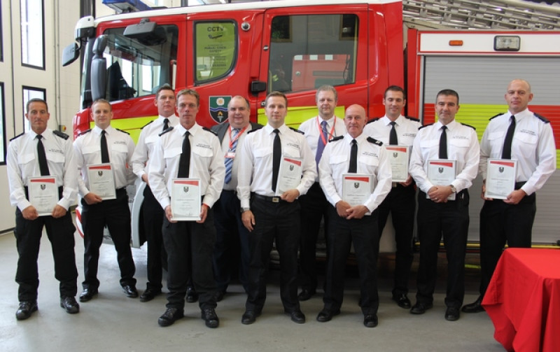 Main image for Firefighters honoured for father and son rescue