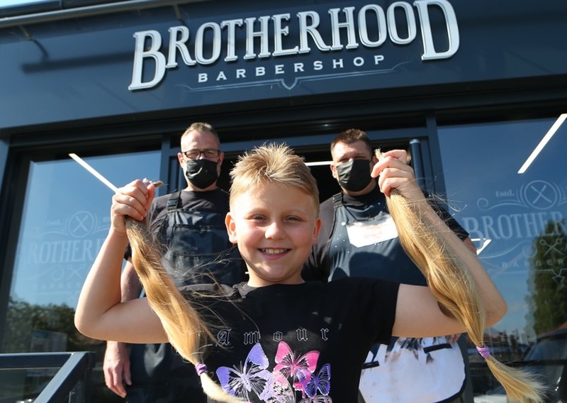 Main image for Ten-year-old chops locks for charity